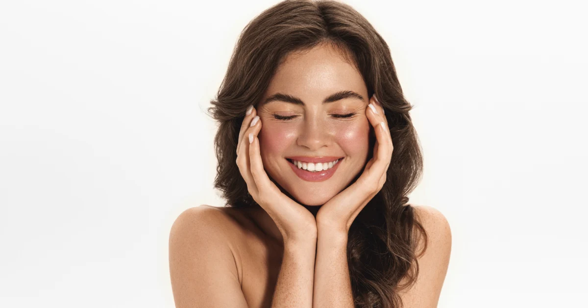 happy woman after microneedling results for acne scars with smoother skin at Hello SKin