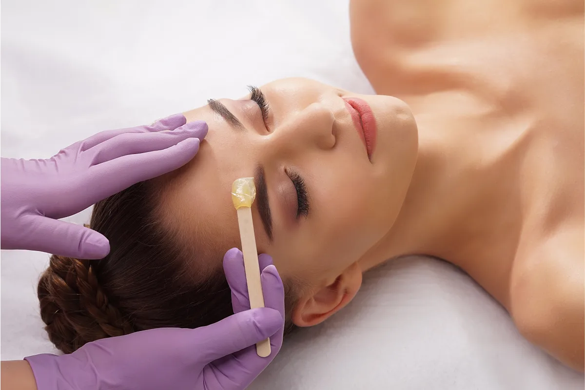 patient getting brow waxing in Nampa, ID